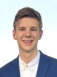 Headshot of Benjamin Lothamer.